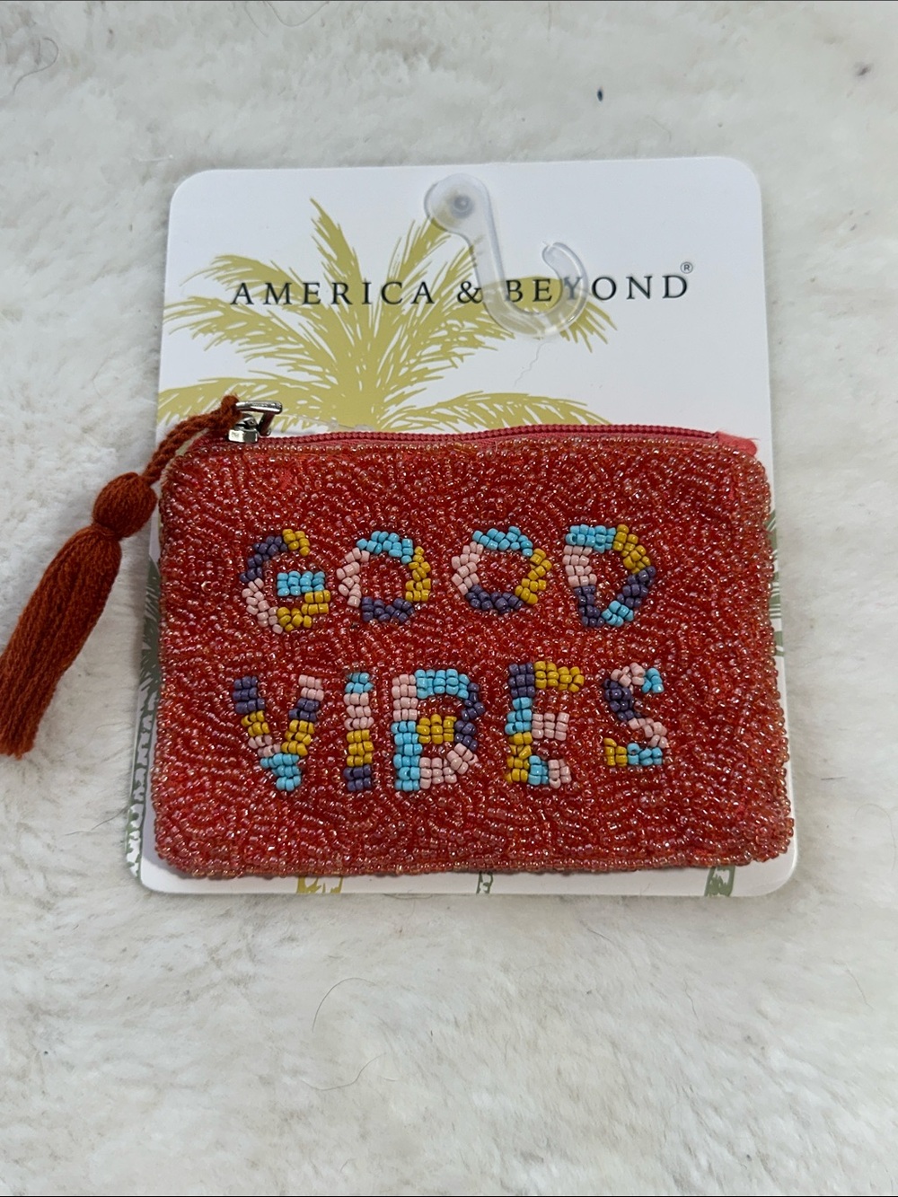 America & Beyond beaded burnt orange mini pouch